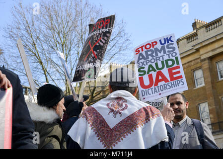 London, UK - March 7th, 2018: Protestors outside Downing Street in London, UK in opposition to Saudi Arabian Crown Prince Mohammed bin Salman’s visit to the UK, in the backdrop of both the UK and Saudi Arabia’s roles in the Yemen conflict which has claimed an estimated 10,000 lives. The powerful heir to the Saudi throne will engage in talks with Prime Minister Theresa May, Foreign Secretary Boris Johnson and the royal family. Both countries seek to widen longstanding defense ties into a far-reaching partnership. Credit: Alexandre Rotenberg/Alamy Live News Stock Photo