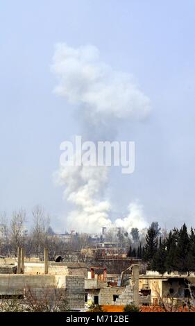 Damascus. 7th Mar, 2018. Smoke resulted from airstrikes rises over the capital Damascus' rebel-held areas of Eastern Ghouta countryside on March 7, 2018. Credit: Ammar Safarjalani/Xinhua/Alamy Live News