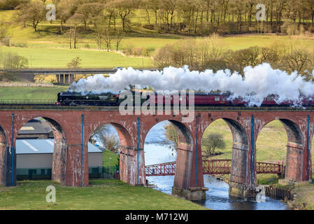 Whalley. United Kingdom.  5th March 2018.  Steam locomotive no..  Restored steam locomotive no. 35018 the British India Line steams over the Whalley Arches viaduct on a test run for West Coast Railways. The Arches have recently had a £1.6m overhaul to counteract flood damage to the Victorian bridge. Credit: John Davidson Photos/Alamy Live News Stock Photo
