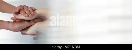 Teamwork transition with people joining hands Stock Photo