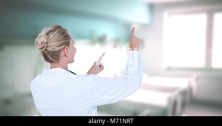 Female doctor interacting with air touch Stock Photo