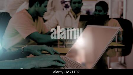 Doctor using laptop Stock Photo