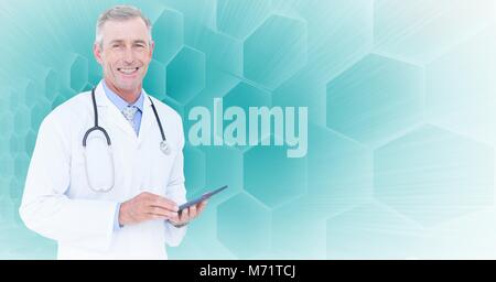 Male doctor holding tablet Stock Photo