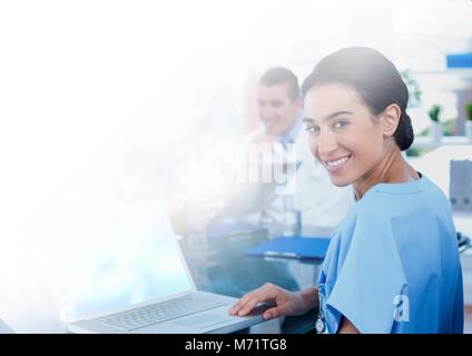Female doctor holding tablet Stock Photo