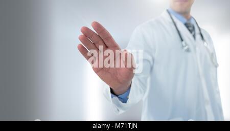 Doctor hand interacting with air touch Stock Photo