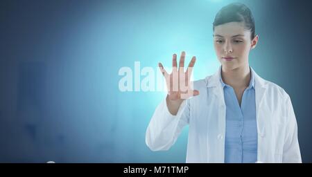 Female doctor interacting with air touch Stock Photo