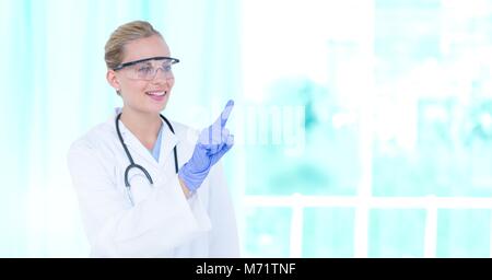 Female doctor interacting with air touch Stock Photo