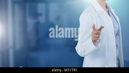 Female doctor interacting with air touch Stock Photo