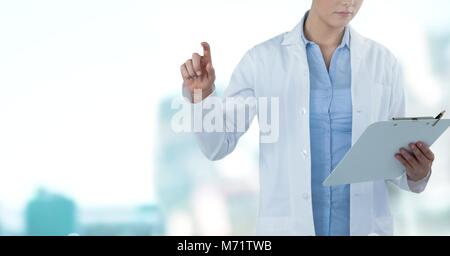 Doctor interacting with air touch Stock Photo