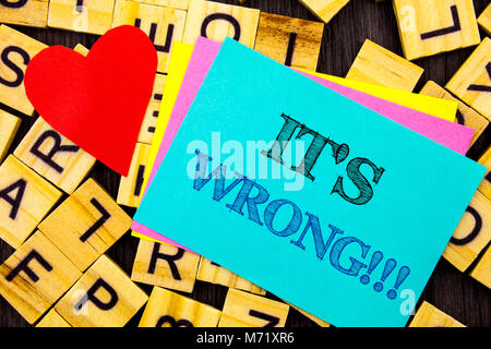 Handwritten text showing It Is Wrong. Conceptual photo Correct Right Decision To Make Or Mistake Advice written colorful sticky note the letter backgr Stock Photo