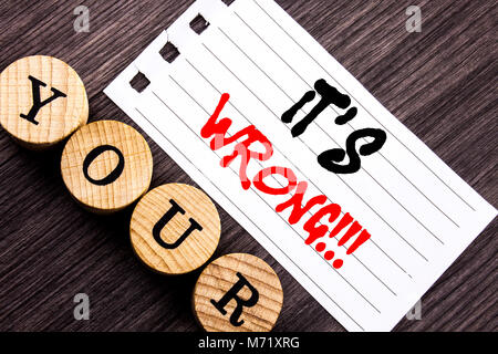 Writing text showing  It Is Wrong. Business photo showcasing Correct Right Decision To Make Or Mistake Advice written tear note paper sticky note the  Stock Photo