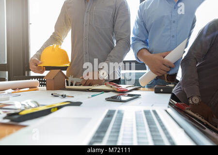 Engineer and Architect concept, Engineer Architects office team working with blueprints Stock Photo