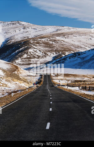 Open empty road with beautiful rode side view at countryside in winter Stock Photo