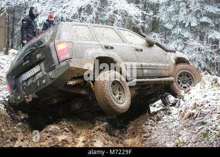 Black Jeep stucked in mud in Tara National Park Stock Photo