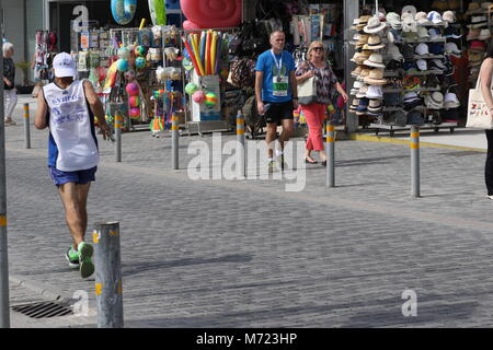 competitors nearing the end of the 20th Logicom Cyprus marathon, half marathon, 10KM, 5KM fun run, Paphos harbour near Paphos fort, Cyprus, Europe Stock Photo