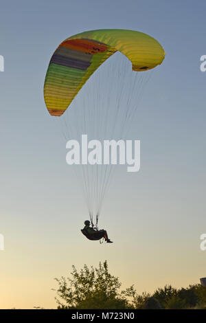 Paragliding on a susnset