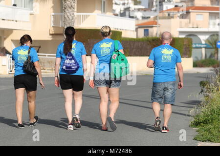 Four runners walking home after the 20th Logicom Cyprus marathon, half marathon, 10KM, 5KM fun run, Paphos, Cyprus, Europe Stock Photo