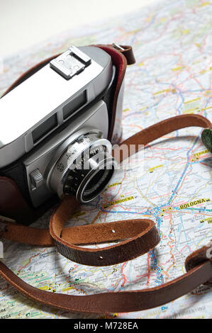 old retro style 35mm rangefinder camera on map of italy Stock Photo
