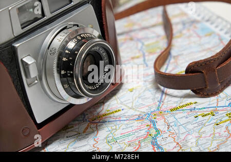 old retro style 35mm rangefinder camera on map of italy Stock Photo
