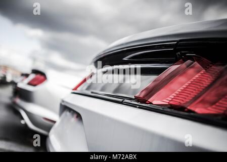 Certified Pre Owned Vehicles in Stock. Car Dealer Lot. Vehicle Rear Closeup. Stock Photo