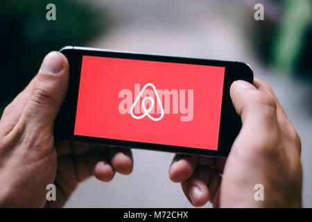 COLOGNE, GERMANY - MARCH 06, 2018: Closeup of iPhone Screen with AIRBNB LOGO Stock Photo