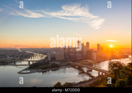 The downtown Pittsburgh skyline with the Allegheny River and the Monongahela River at sunrise in Pittsburgh, Pennsylvania, USA. Stock Photo