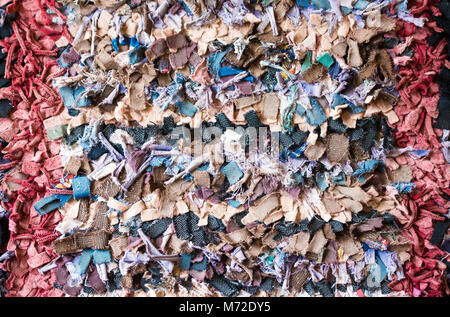 Old fashioned traditional oriental carpet with rags, as background Stock Photo