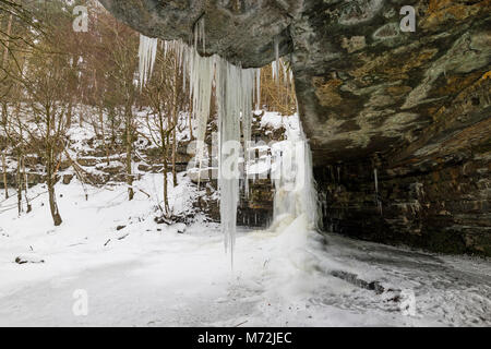 A Frozen Summerhill Force Viewed From Gibson's Cave, Bowlees, Upper Teesdale, County Durham, UK. Stock Photo