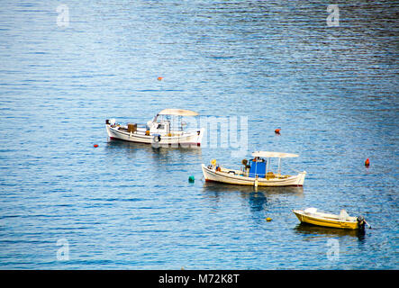 Above view of three small fishing boats in a row Stock Photo