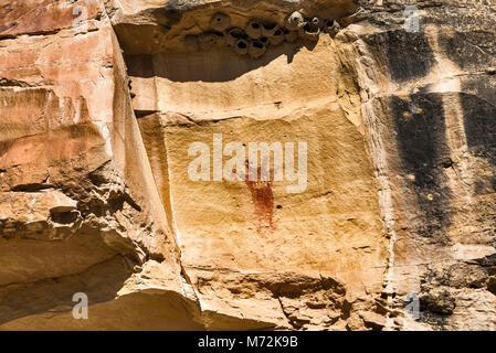 Waving Hands Site pictographs art panel, bullet holes damage, Canyon Pintado Historic District, near Rangely, Colorado, USA Stock Photo