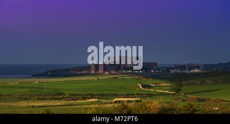 View of Wylfa Power Station from Late Afternoon into Night Time Stock Photo
