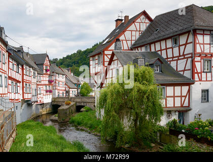 Picturesque village Monreal with half timbered houses along creek Eltzbach in the Eifel, district Mayen-Koblenz Rhineland-Palatinate, western Germany Stock Photo