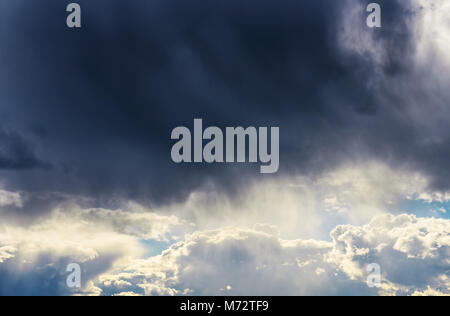Low angle view of dark clouds on the sky Stock Photo