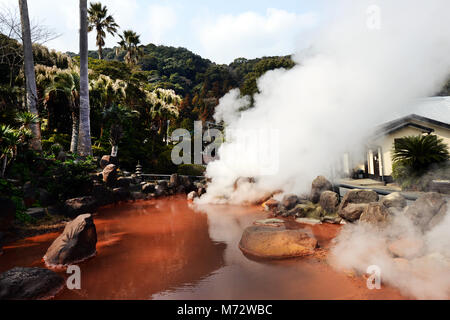 A small blood pond hot spring in the Umi Jigoku complex. Stock Photo