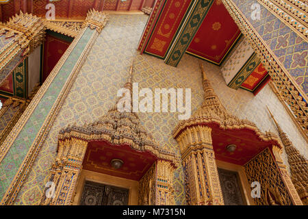 Architectural details of the main temple inside the Grand Palace in Bangkok view from below Stock Photo