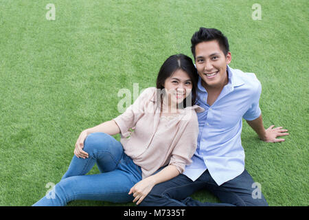 happy asian couple concept with smiley young man and woman Stock Photo