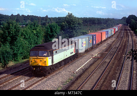 A class 47 diesel locomotive number 47289 working a freightliner service at Lower Basildon on the Great Western main line. 21st August 2002.