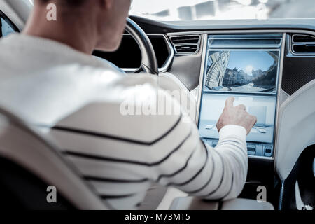 Nice handsome man sitting in his car Stock Photo