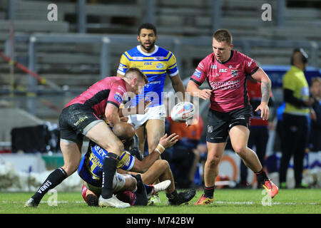 8th March 2018 , Headingley Stadium, Leeds, England; Betfred Super League, round 5, Leeds Rhinos versus Hull FC; Jamie Jones-Buchanan of Leeds Rhinos is tackled by Marc Sneyd of Hull FC Stock Photo