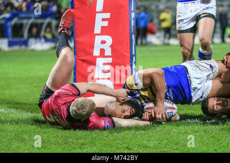 8th March 2018 , Headingley Stadium, Leeds, England; Betfred Super League, round 5, Leeds Rhinos versus Hull FC; Jordan Abdull of Hull FC blocks Jamie Jones-Buchanan of Leeds Rhinos from touching down Stock Photo