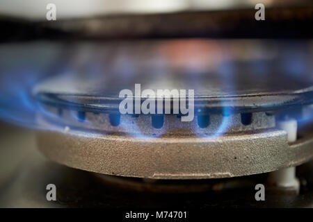 gas ring burning on kitchen hob using natural piped gas supply in the uk Stock Photo