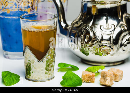 Arabic mint tea in a traditional decorated cup Stock Photo