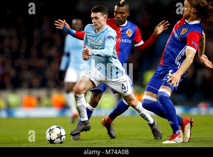 Manchester City's Phil Foden (left) in action