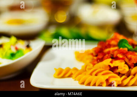 tasty dish with pasta, meat and sauce, Italian dish, fast and simple dish, lunch or dinner Stock Photo