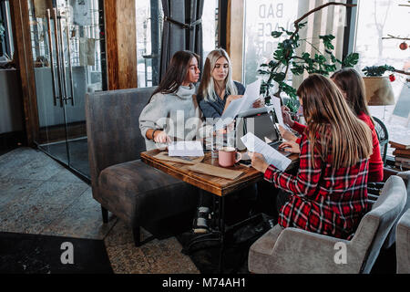 four modern business people working on laptop. Stock Photo