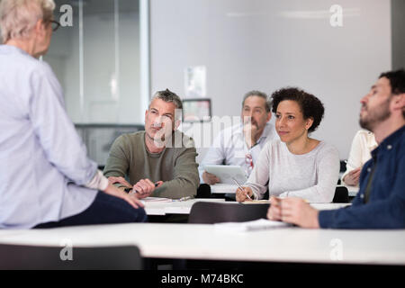 Mature students on adult education course Stock Photo