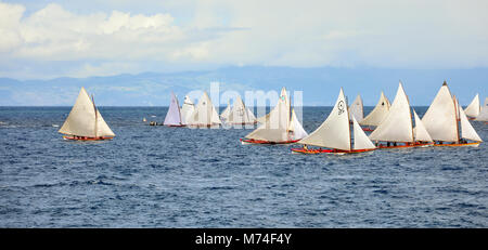 Whaling boats regattas in the sea channel between Faial and Pico islands during the Sea Week Festival. Faial, Azores islands, Portugal Stock Photo