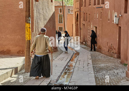 Abyaneh, Iran - April 26, 2017: in the traditional mountain village a local elderly man walks. Stock Photo