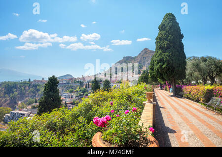 Landscape with garden path in city public park at Taormina. Sicily, Italy Stock Photo