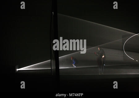 Solid Light works is the first major UK exhibition of artist Anthony McCall work in over a decade. The exhibition included three new 'solid light' installations. McCall is best known for his large scale, immersive sculptural light installations that incorporate the visitor and invite them to become active participants in the work. Stock Photo